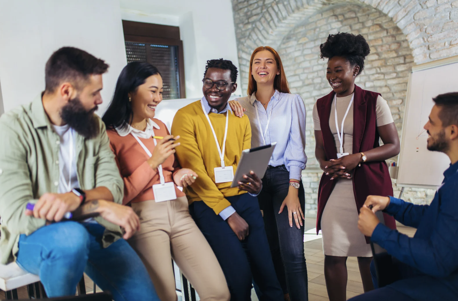 A diverse group of adults participating in an organizational learning experience
